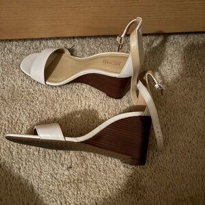 Michael Kors wedges size 6.5 worn very few times.